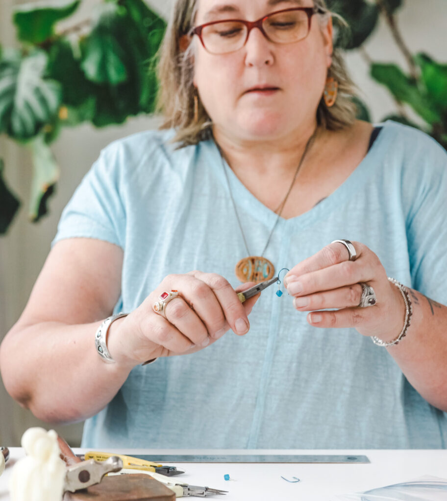 Rebecca making an earring