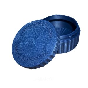 TwistLock metal clay canister with removable lid shown open and closed on a light wood work surface